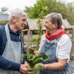 Long-term Couple Working in the Garden with Love